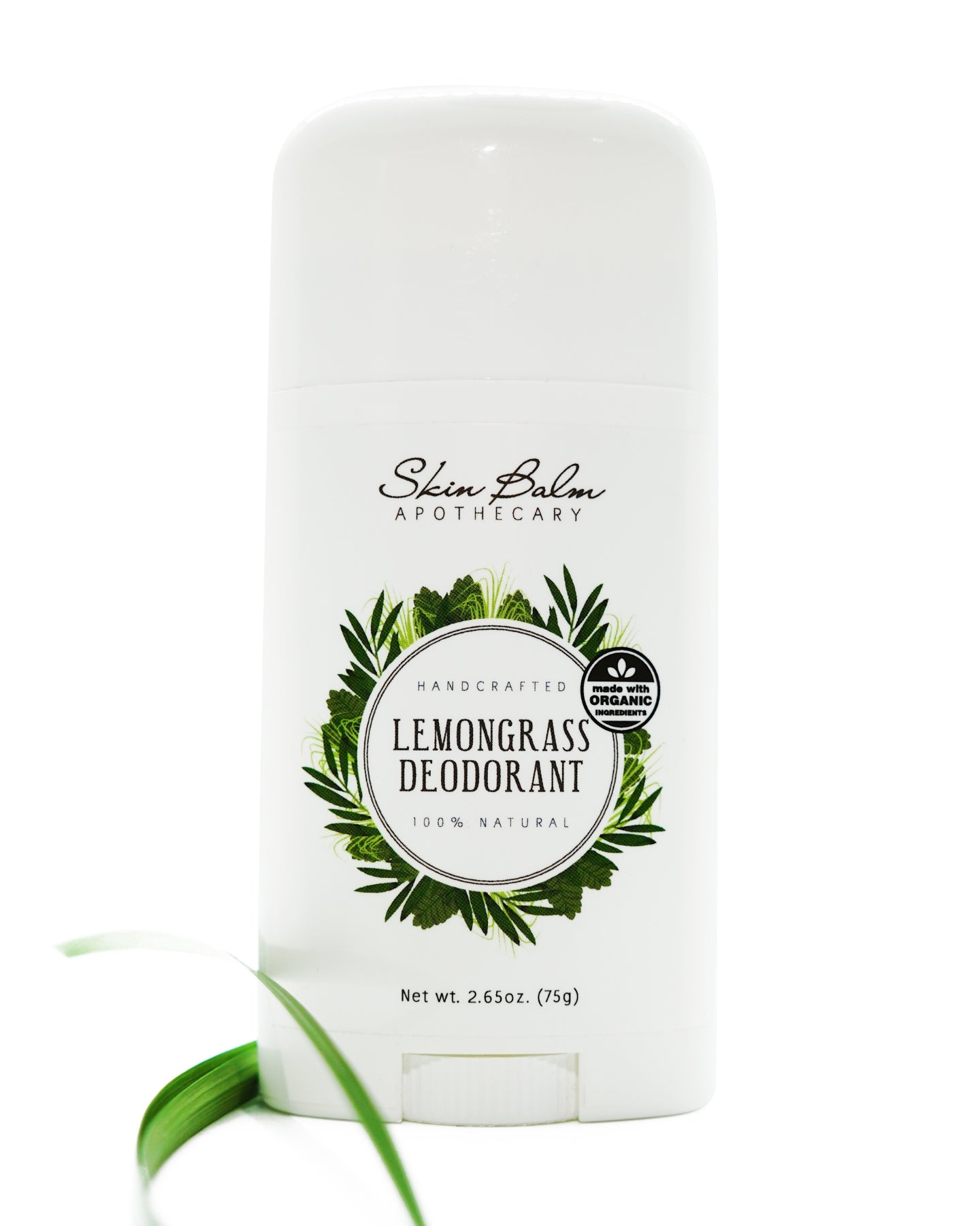 Lemongrass Deodorant with green foliage against a white background.