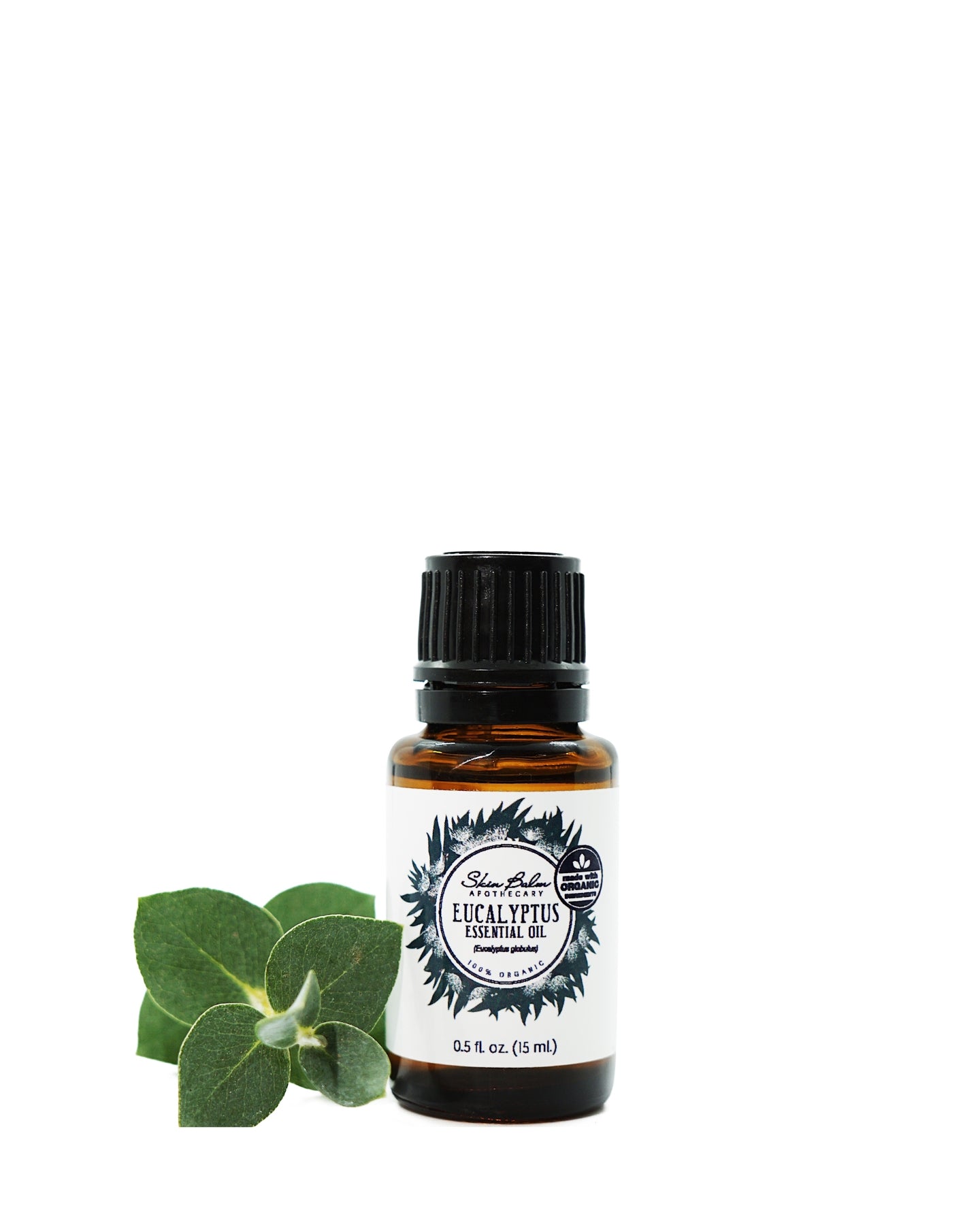 Organic Eucalyptus Essential Oil with a eucalyptus stem against a white background.