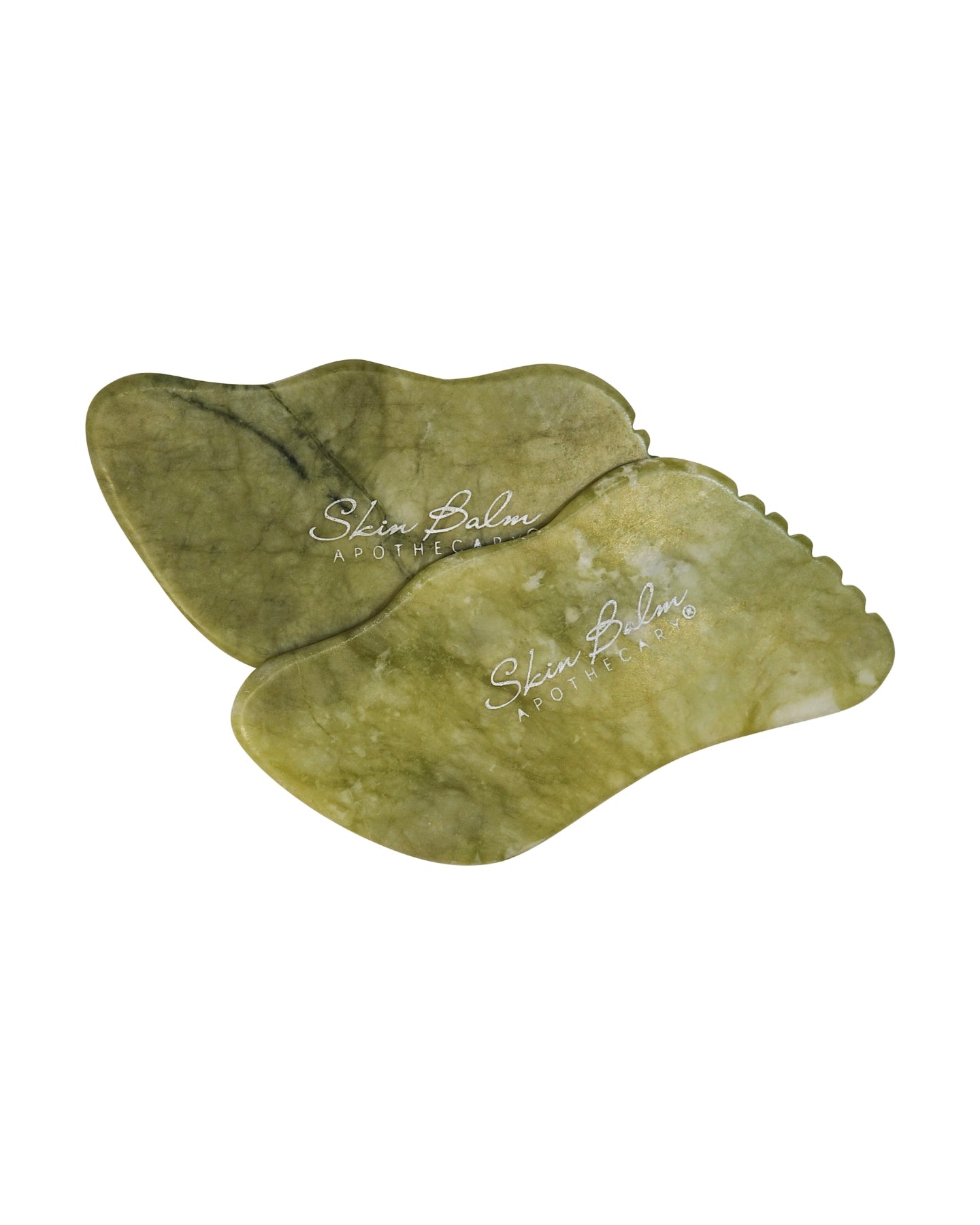 Jade Facial Stone against a white background.
