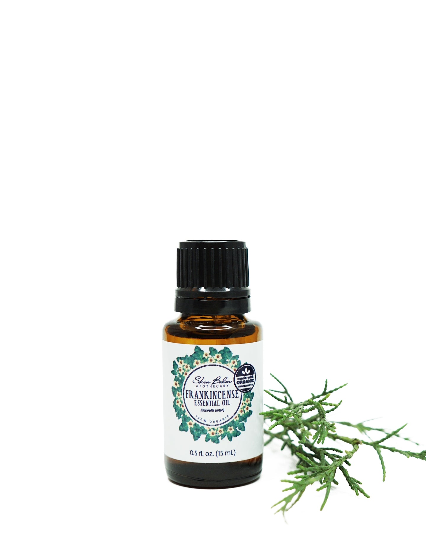 Organic Frankincense Essential Oil against a white background.