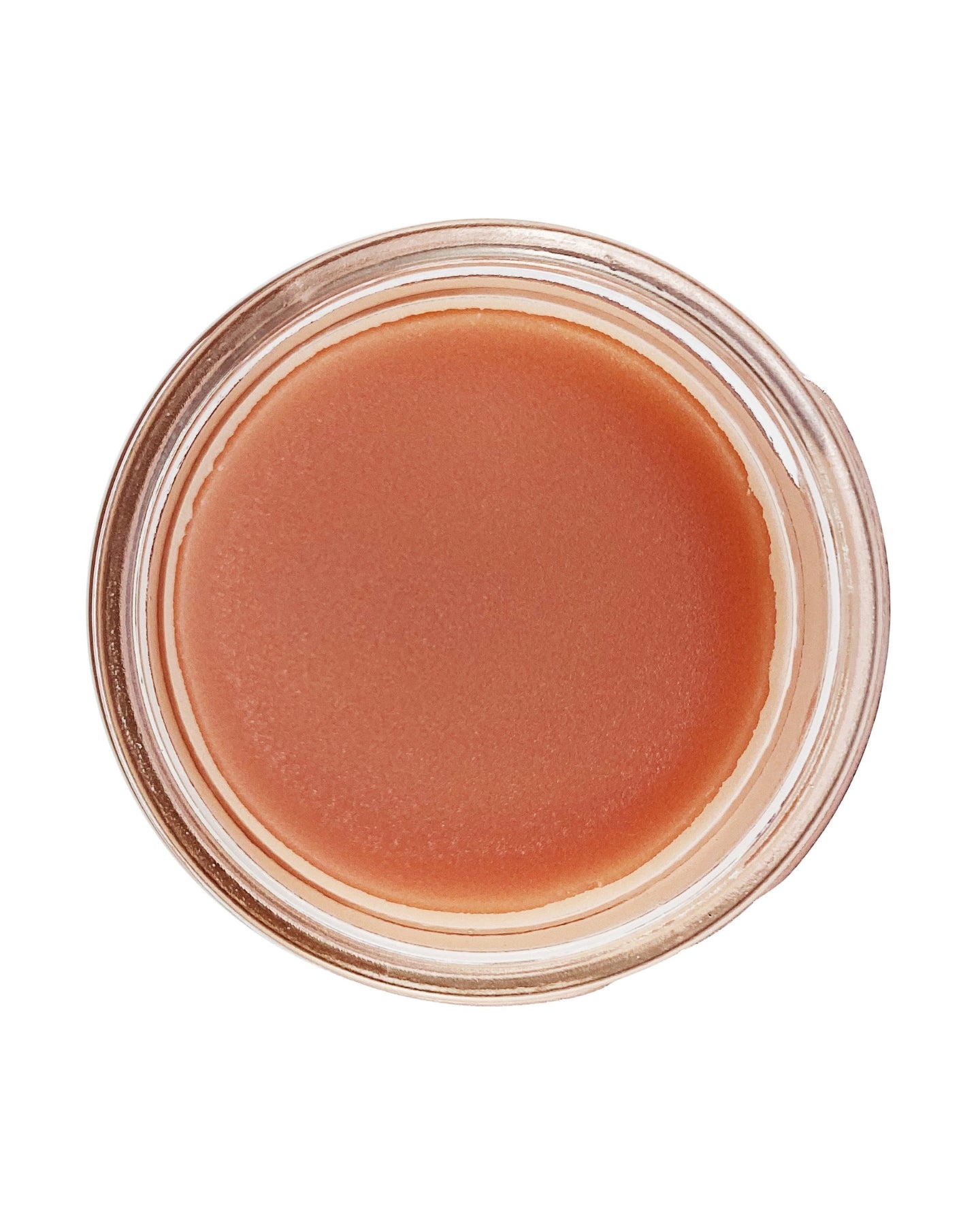 A close-up shot of the Sweet Dreams Glow Balm, enlarged to show texture.